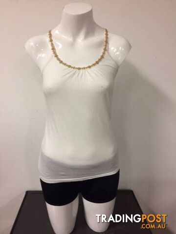 white top with gold lace