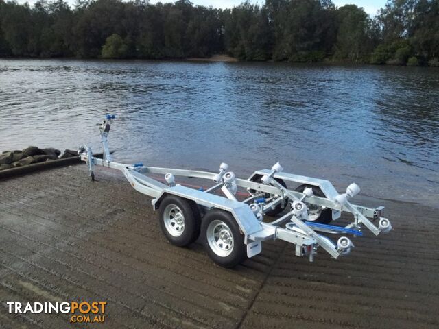 GAL BOAT TRAILER TO SUIT UP TO A 5.35 mt FIBREGLASS HULL TANDEM AXLE TARE 430 kg ATM 1999 kg BRAKED 