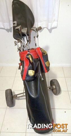Right handed golf clubs, buggy and bag.  The lot for not much
