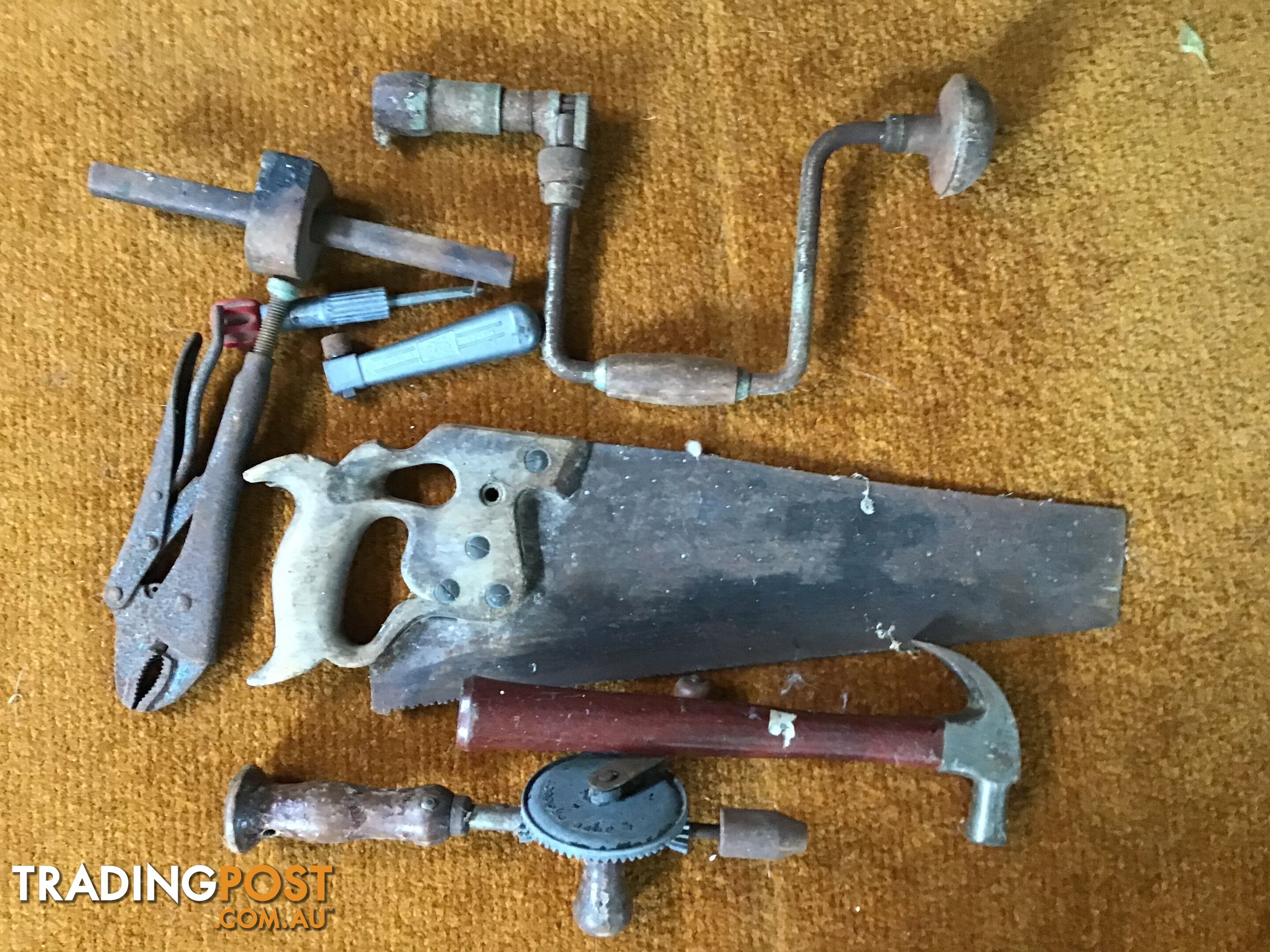 A GROUP OF OLD HANDYMANS TOOLS