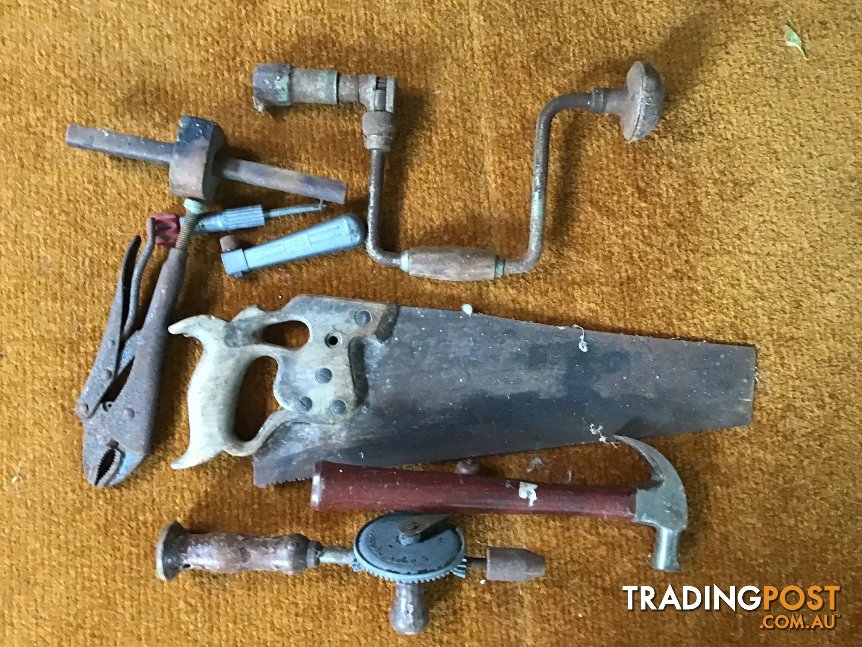 A GROUP OF OLD HANDYMANS TOOLS