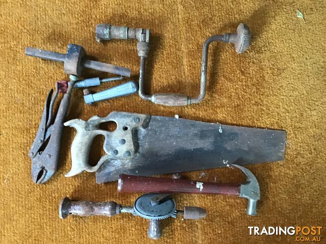 A GROUP OF OLD HANDYMANS TOOLS