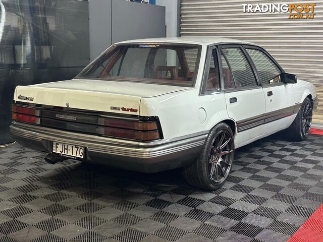 1986 HOLDEN COMMODORE SL VL 4D SEDAN