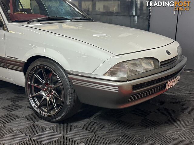 1986 HOLDEN COMMODORE SL VL 4D SEDAN