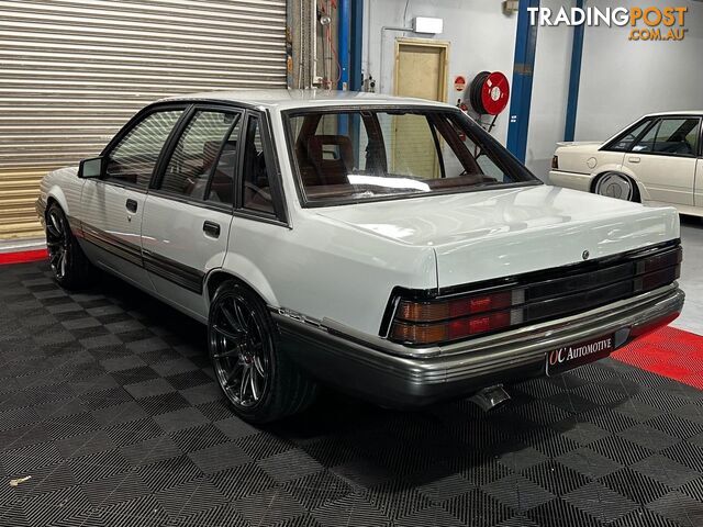 1986 HOLDEN COMMODORE SL VL 4D SEDAN