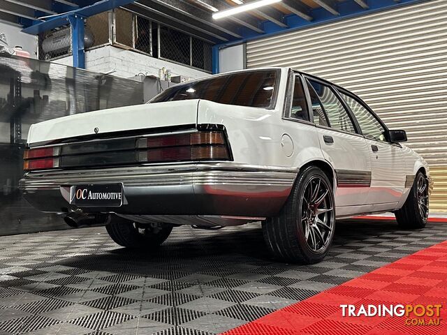 1986 HOLDEN COMMODORE SL VL 4D SEDAN