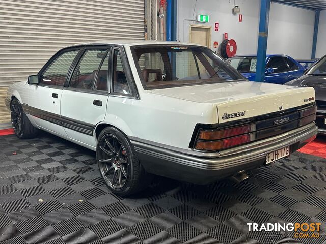 1986 HOLDEN COMMODORE SL VL 4D SEDAN