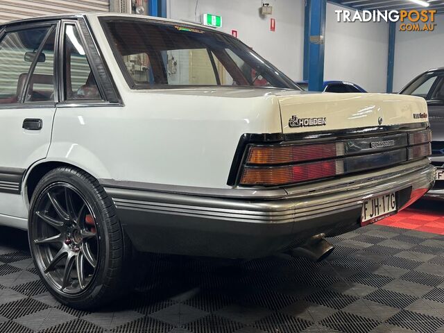 1986 HOLDEN COMMODORE SL VL 4D SEDAN