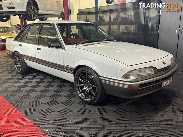 1986 HOLDEN COMMODORE SL VL 4D SEDAN