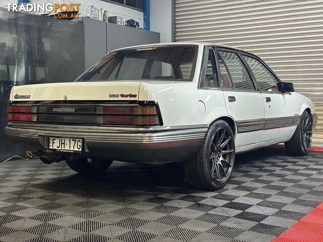 1986 HOLDEN COMMODORE SL VL 4D SEDAN