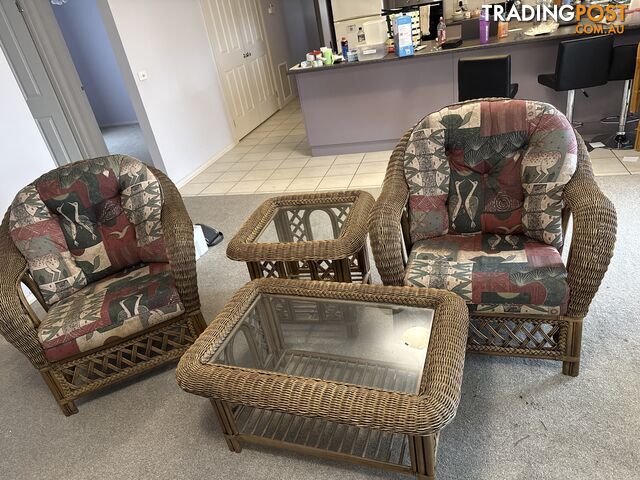 Cane chairs and coffee tables