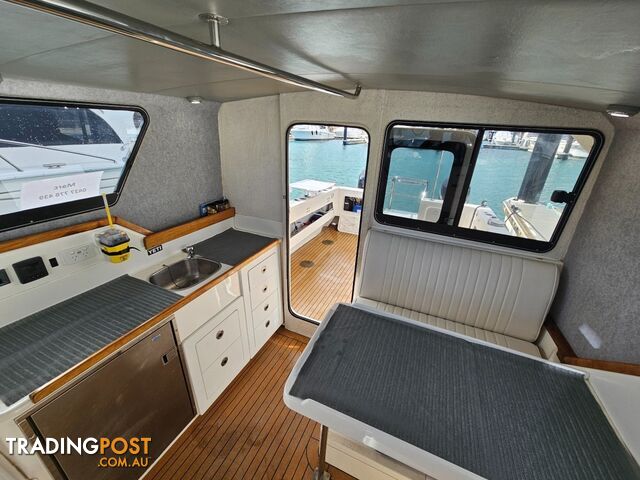 2005 Noosa Cat 3100 Cuddy