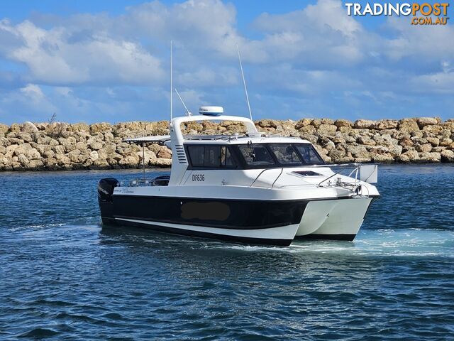 2005 Noosa Cat 3100 Cuddy