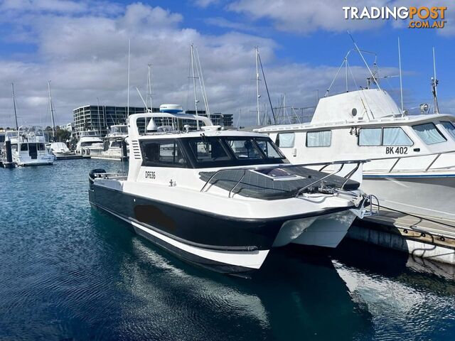 2005 Noosa Cat 3100 Cuddy