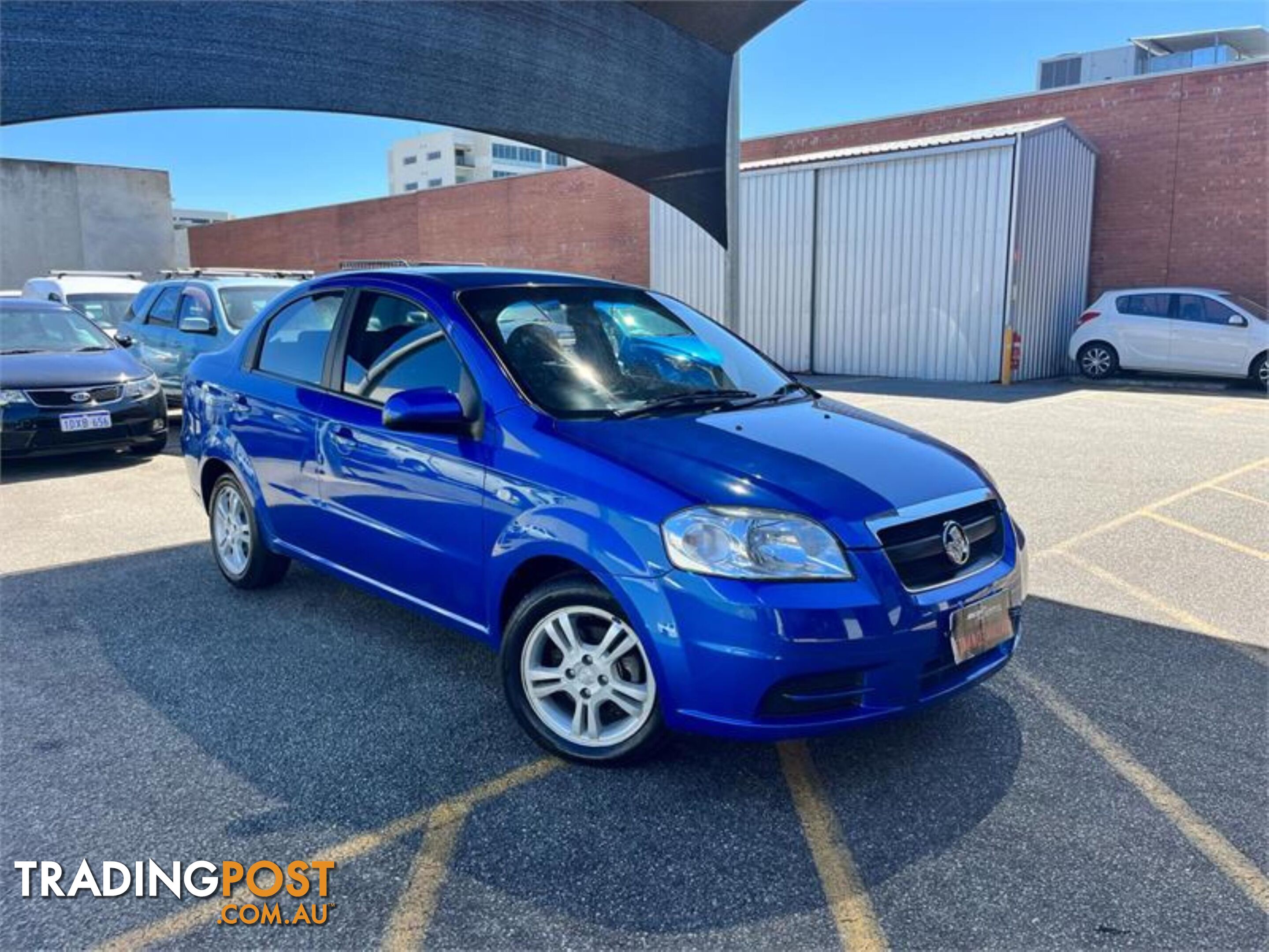 2010 HOLDEN BARINA  TKMY10 4D SEDAN