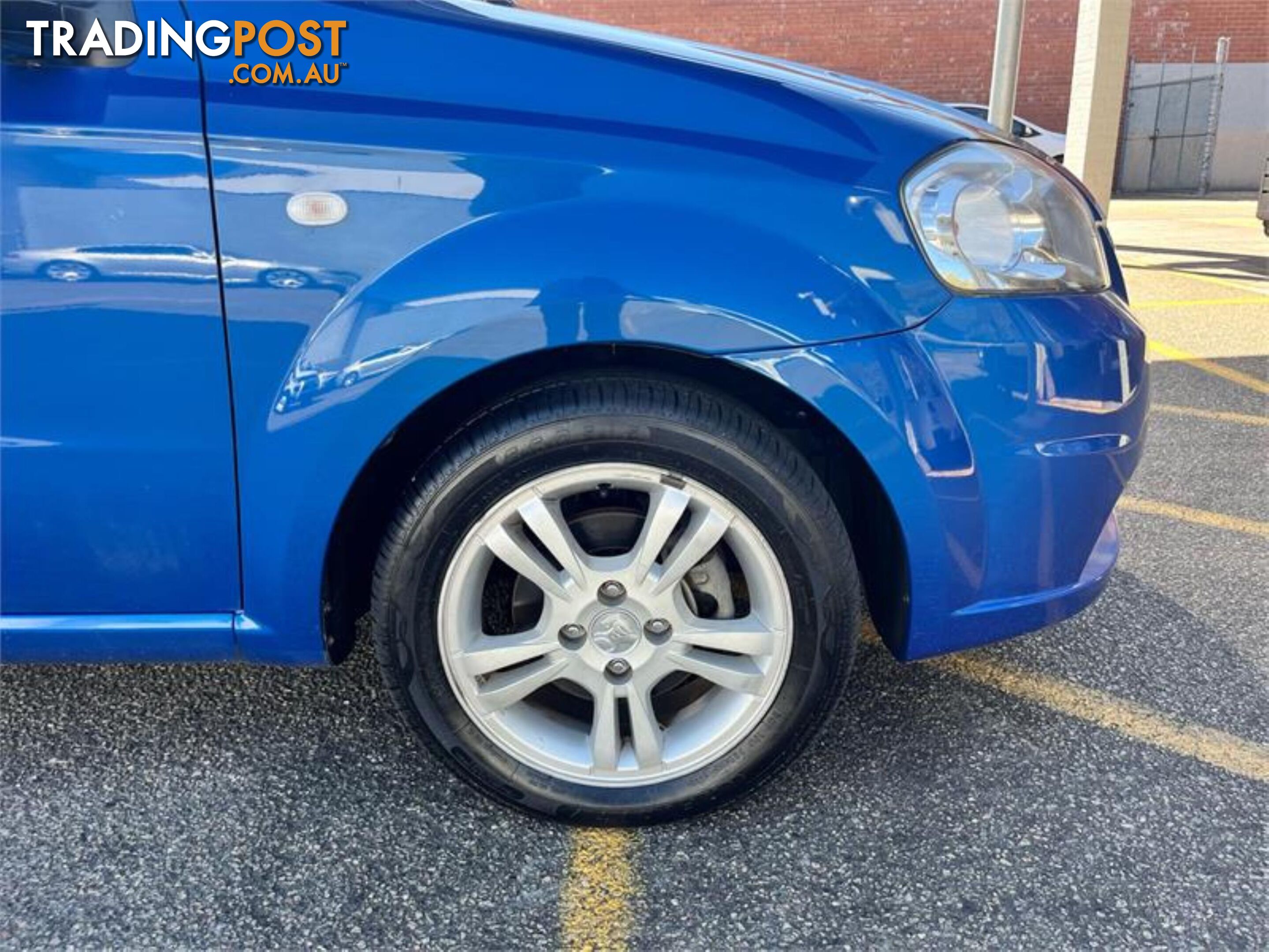 2010 HOLDEN BARINA  TKMY10 4D SEDAN