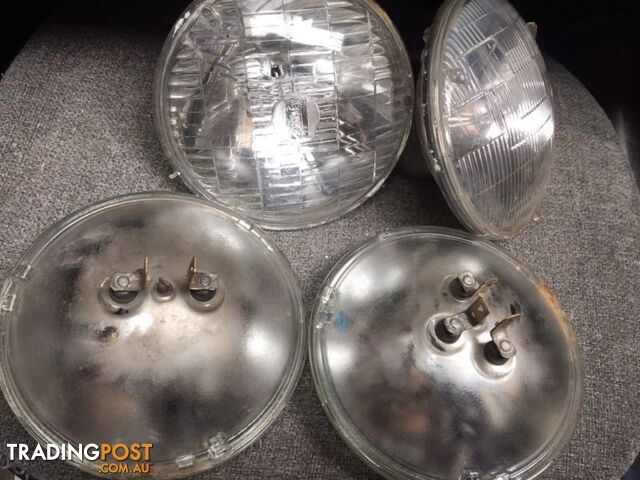 Chev 5.75" 5 3/4 Sealed head lights / with chrome eye lids