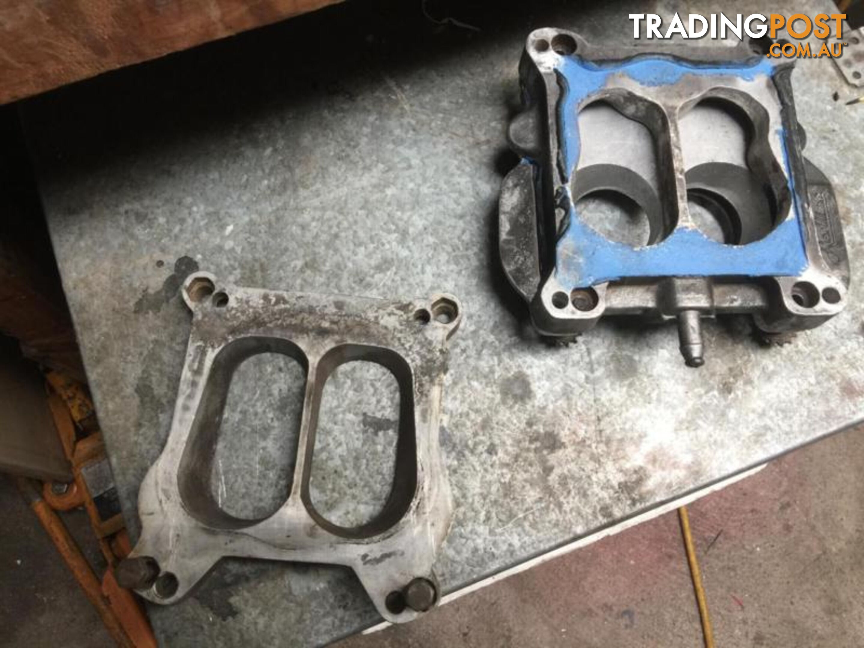 Carburettor spacer and adapter plates