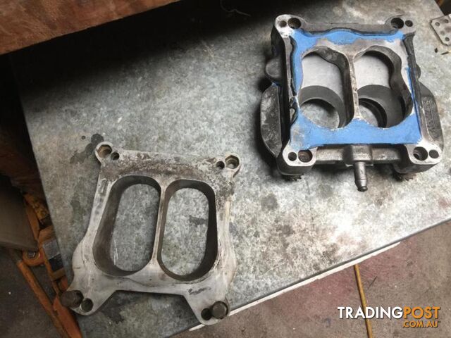 Carburettor spacer and adapter plates