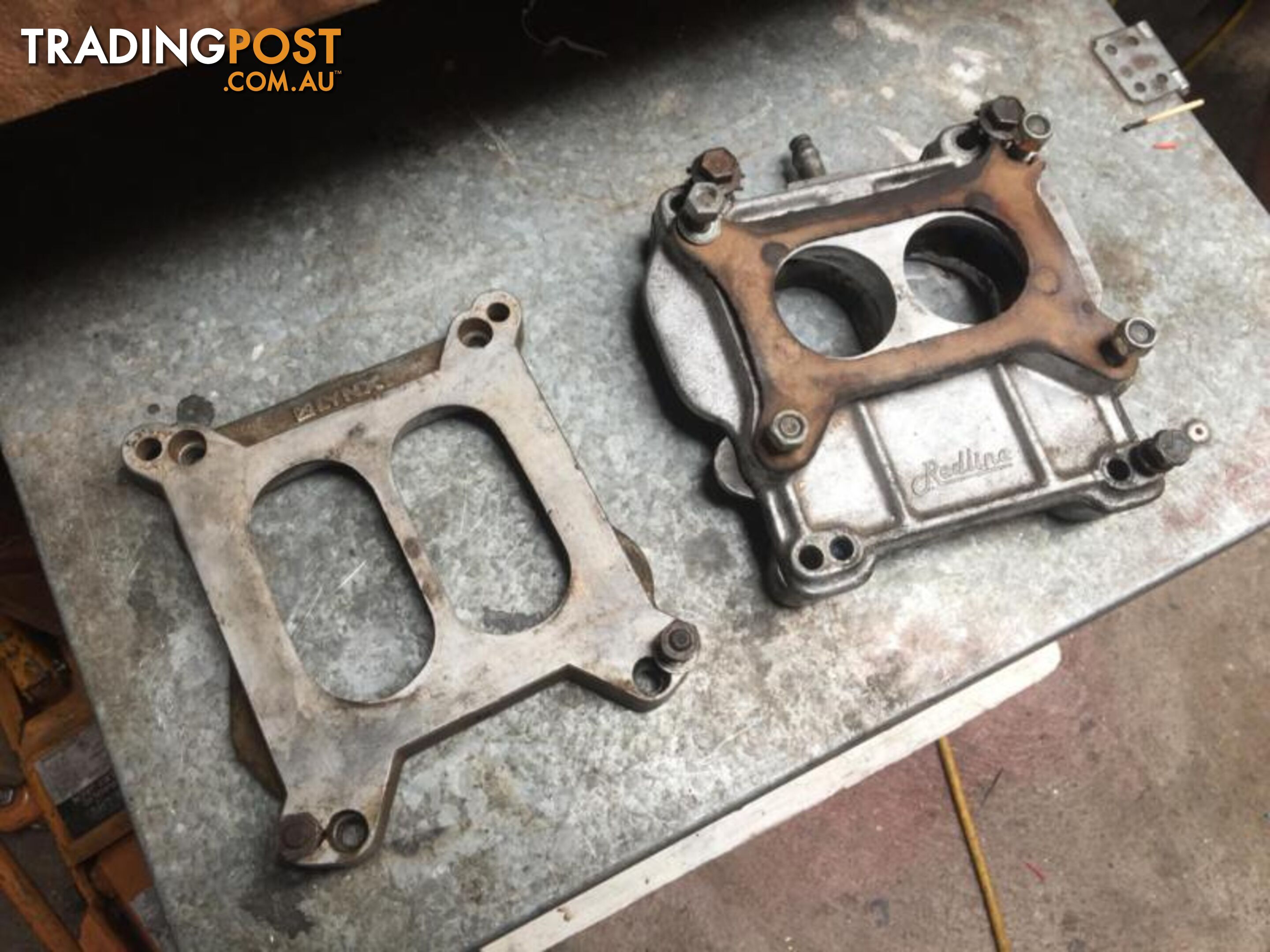 Carburettor spacer and adapter plates