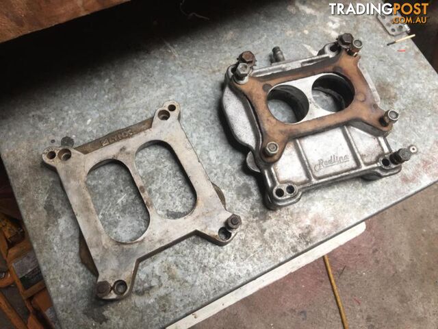 Carburettor spacer and adapter plates