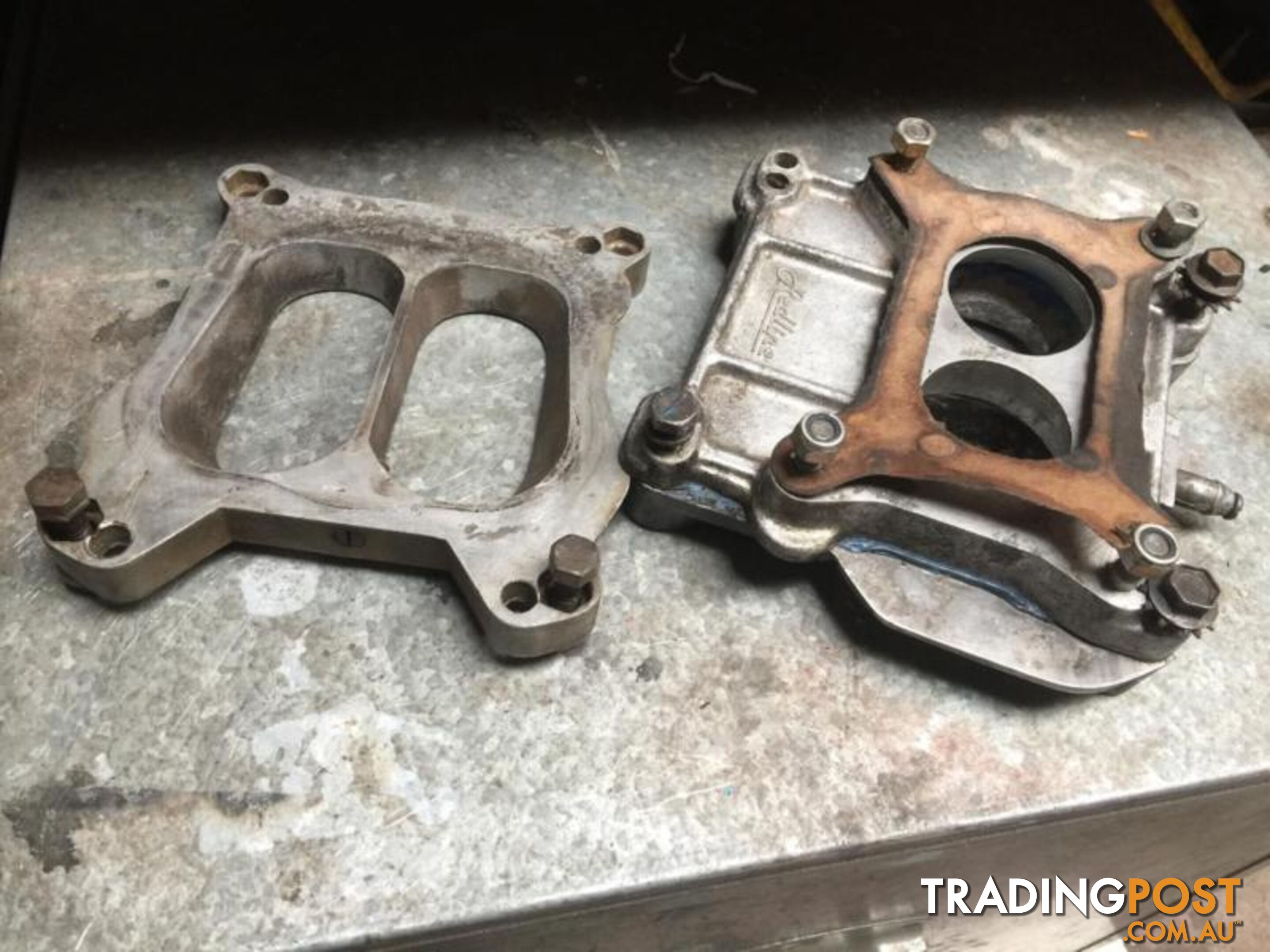 Carburettor spacer and adapter plates