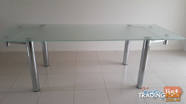 Glass top dining table