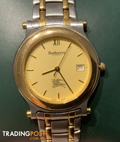 Burberry Unisex gold plated fashion watch
