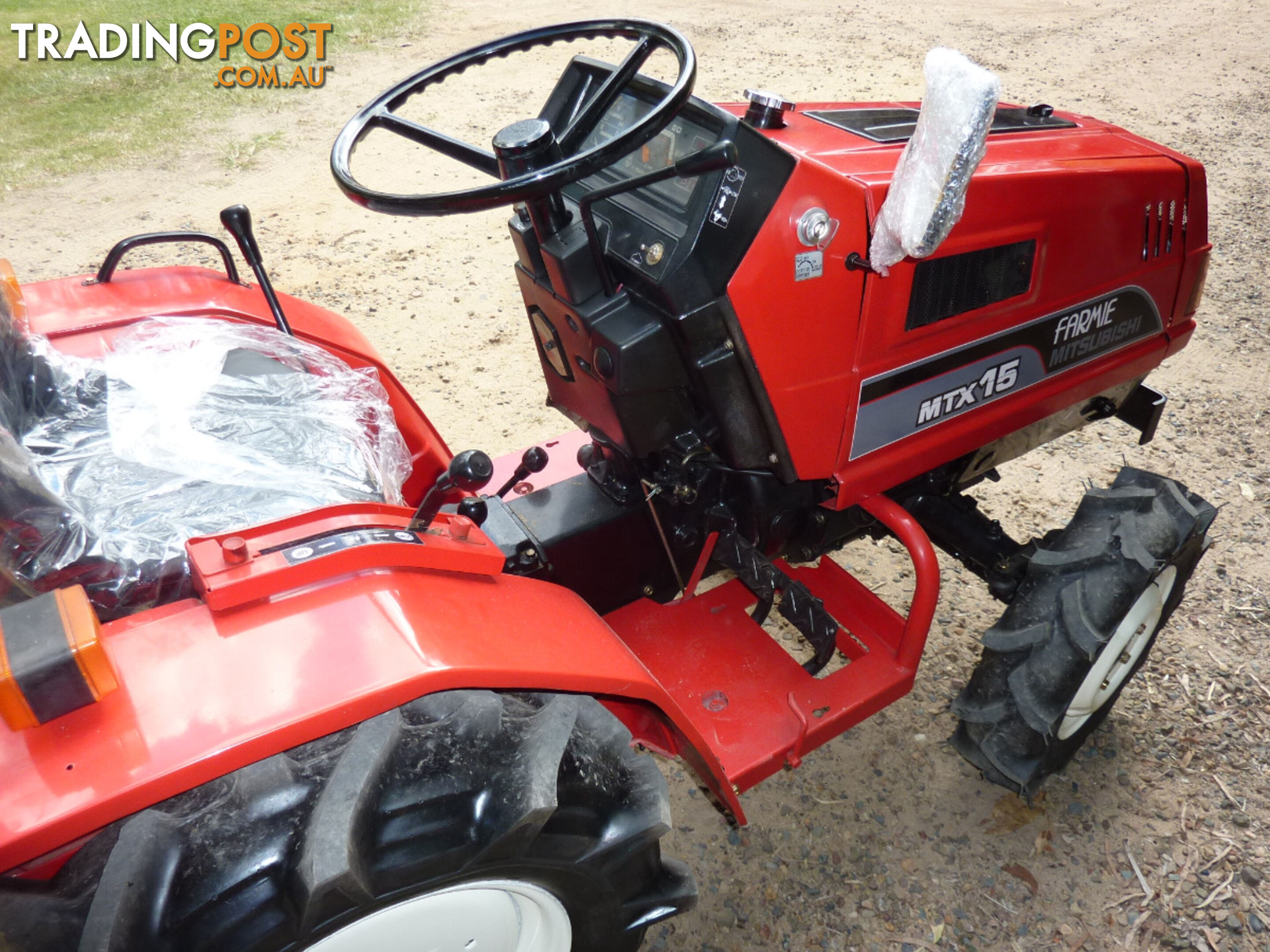 MITSUBISHI TRACTOR 4 X 4 WITH MOWER.