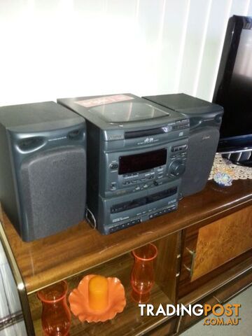 Radio, cd and casette player come with remote control - photo 2 of 3