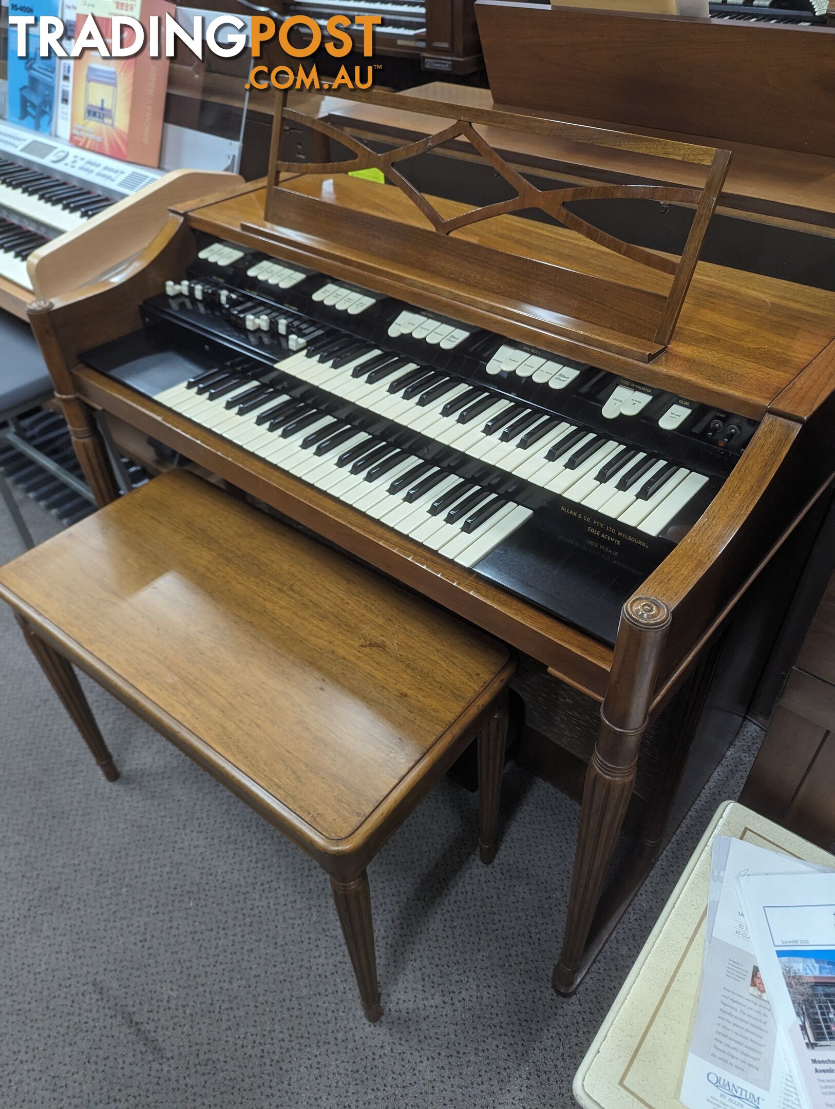 Hammond M100 Series Tone Wheel Organ - M-111, tradition style in walnut.