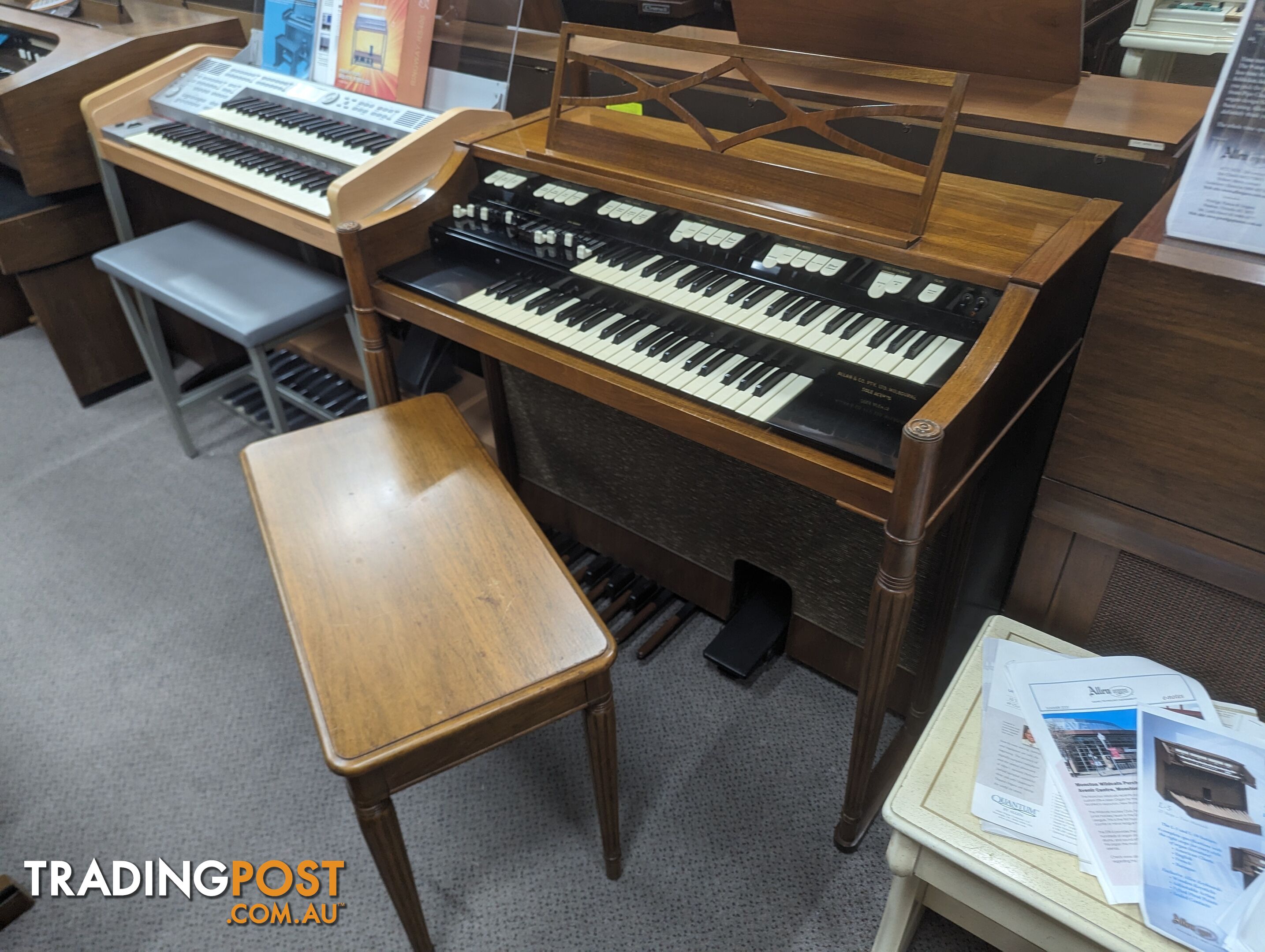 Hammond M100 Series Tone Wheel Organ - M-111, tradition style in walnut.