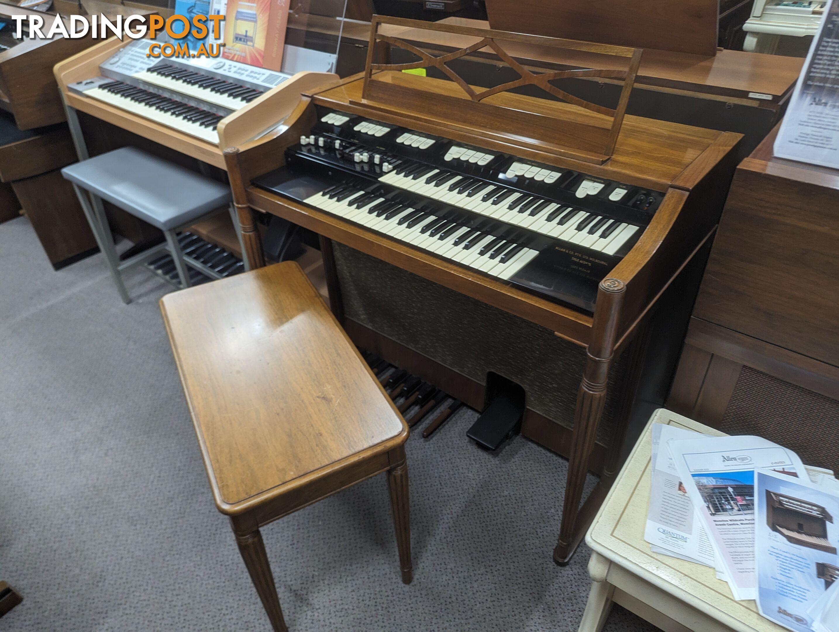 Hammond M100 Series Tone Wheel Organ - M-111, tradition style in walnut.