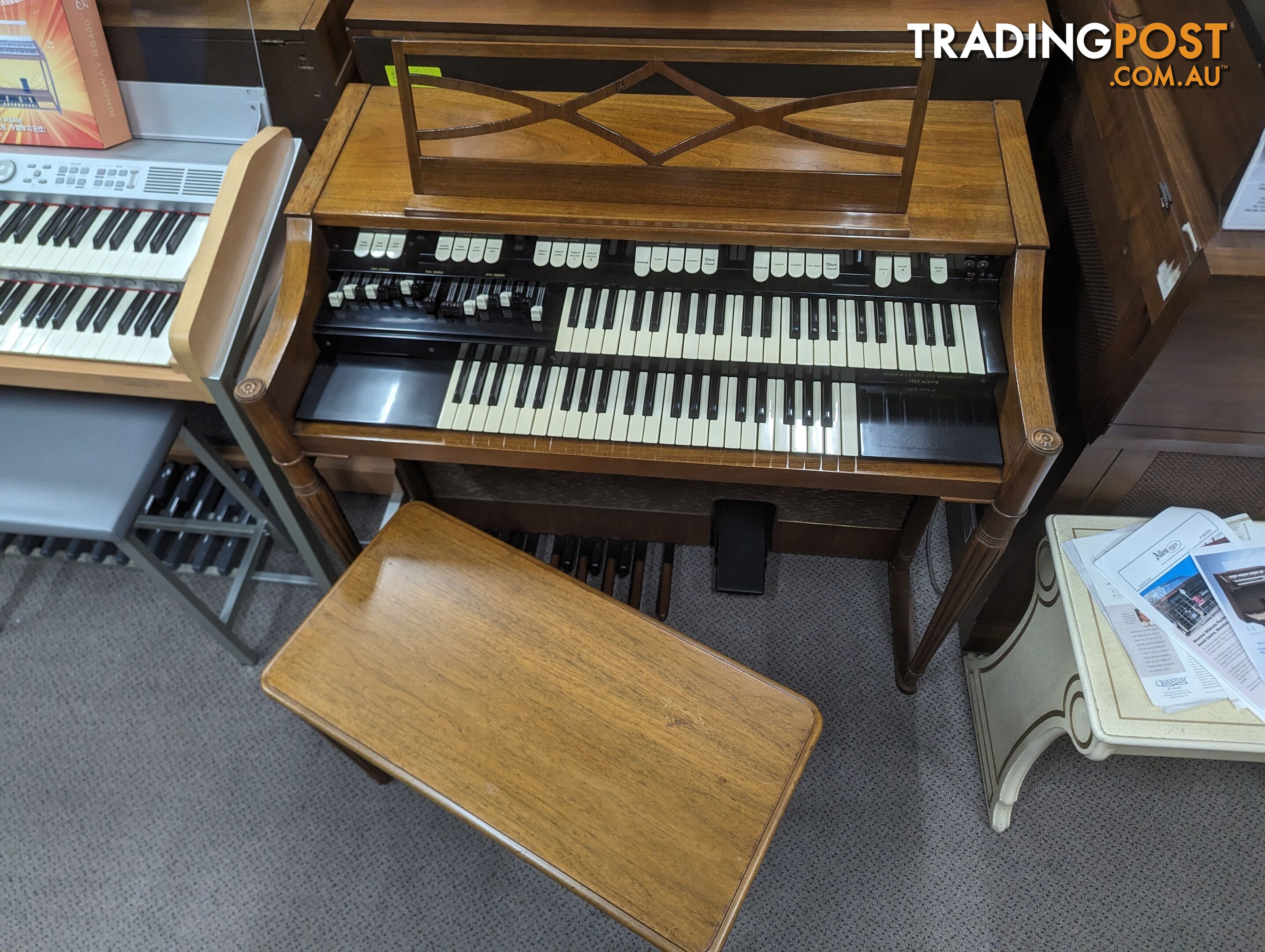 Hammond M100 Series Tone Wheel Organ - M-111, tradition style in walnut.