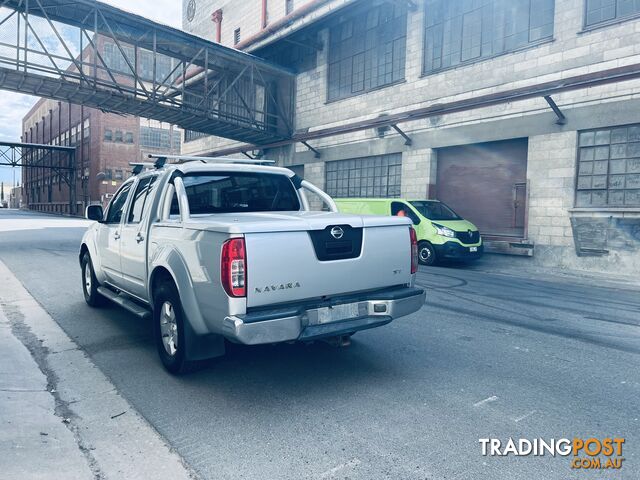 2010 Nissan Navara ST (4x4) Turbo Diesel Ute 5 Speed Automatic