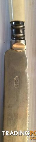 Vintage carving bread knife Stainless nickel with faux bone hand - photo 3 of 4