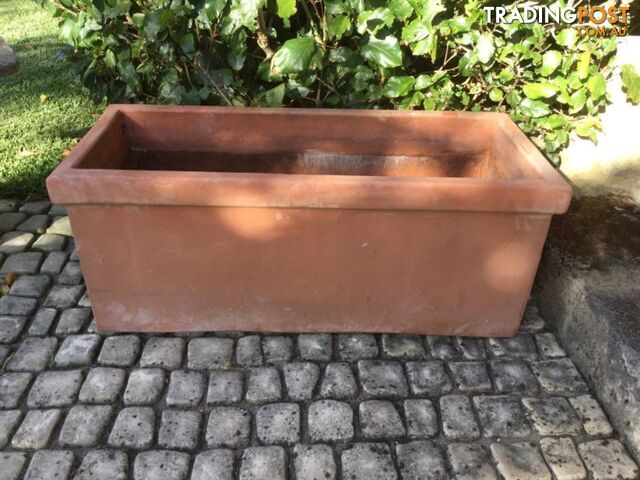 Large terracotta planter Has drainage holes