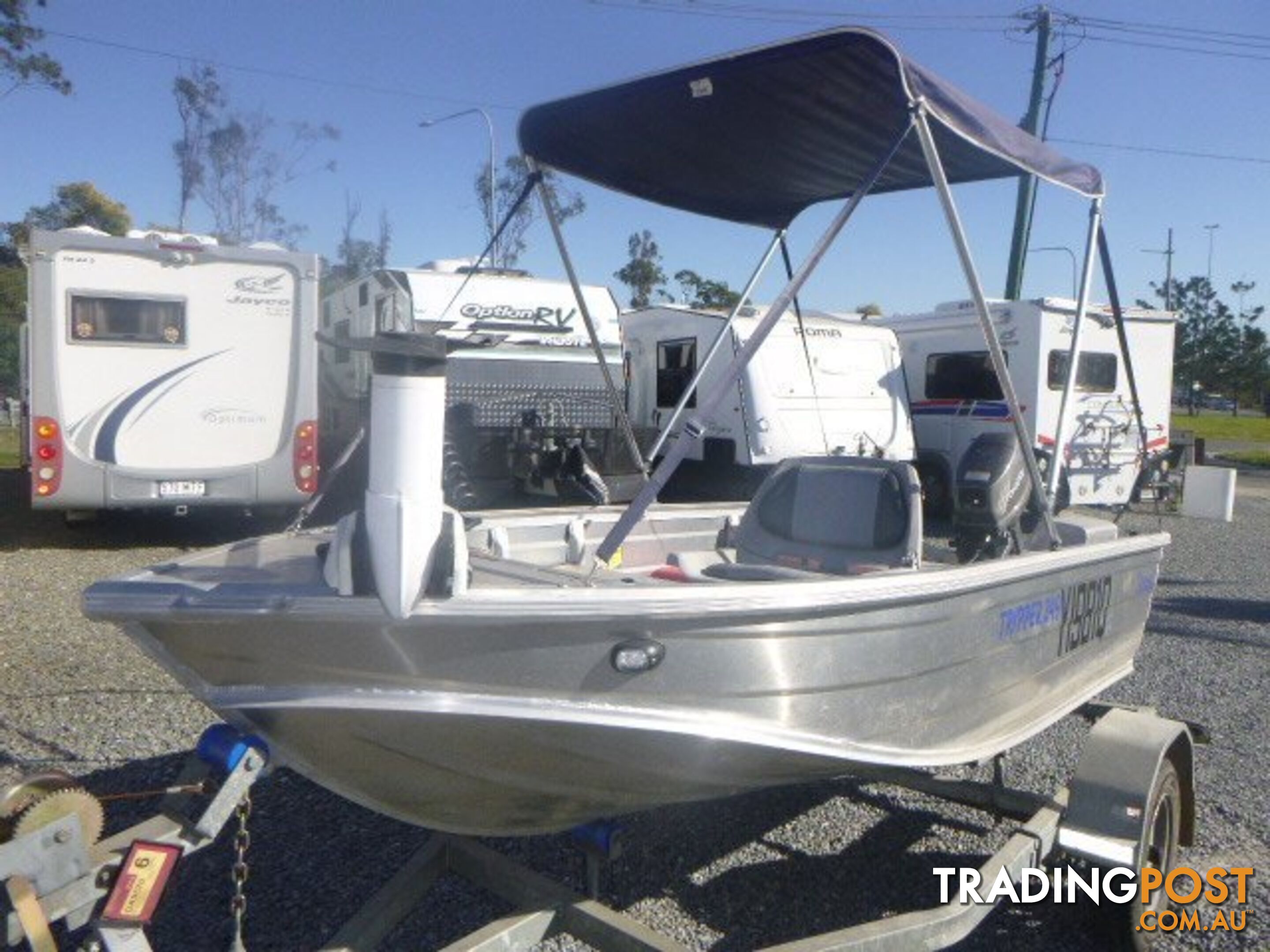 STESSCO TRIPPER 349 -18HP TOHATSU OUTBOARD & TRAILER