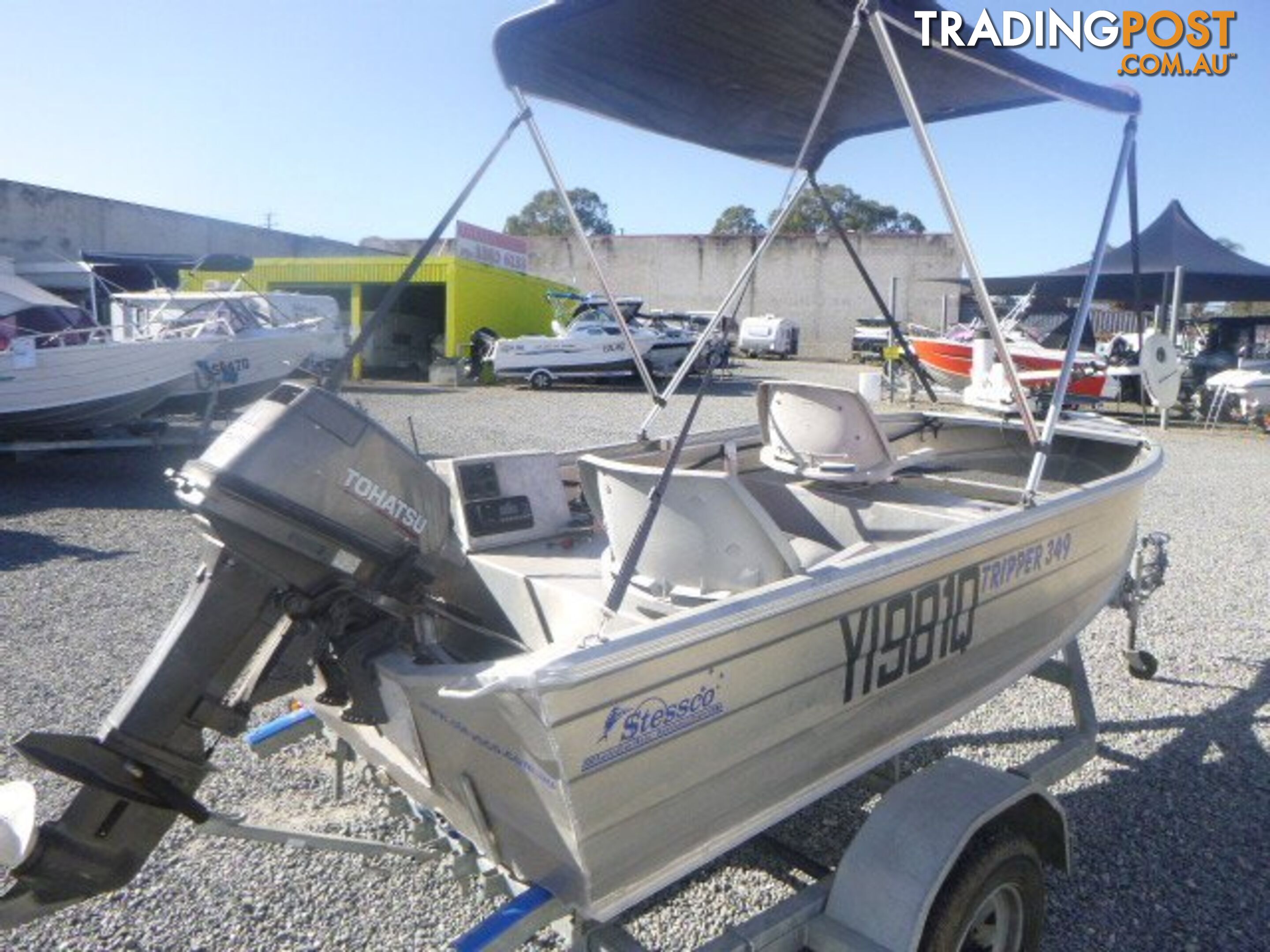 STESSCO TRIPPER 349 -18HP TOHATSU OUTBOARD & TRAILER