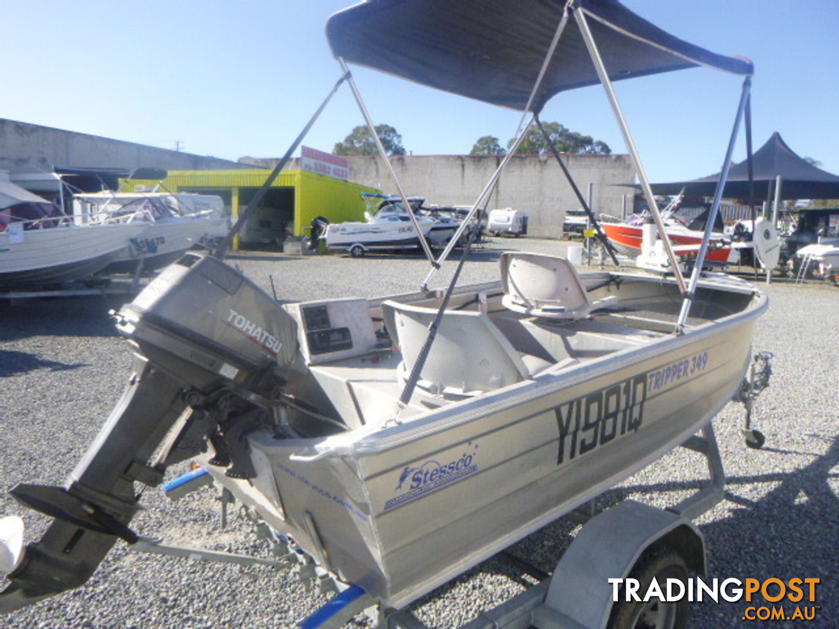 STESSCO TRIPPER 349 -18HP TOHATSU OUTBOARD & TRAILER