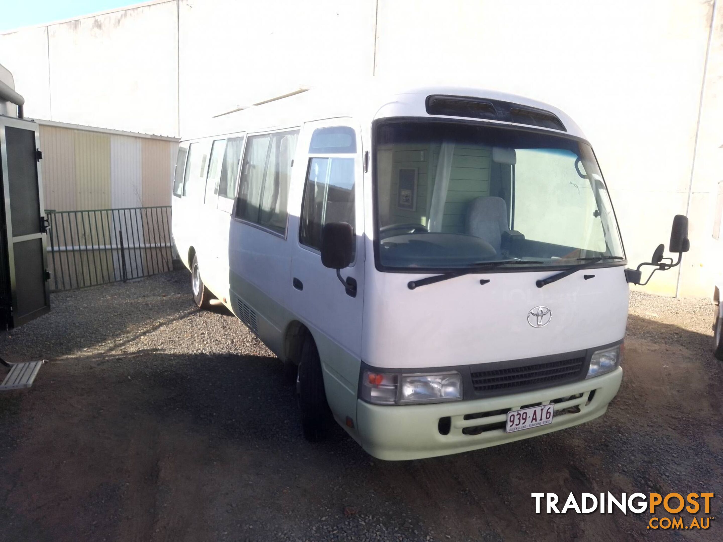 TOYOTA COASTER BUS DIESEL 6.6M TOURING MOTORHOME