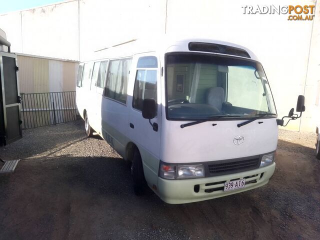 TOYOTA COASTER BUS DIESEL 6.6M TOURING MOTORHOME