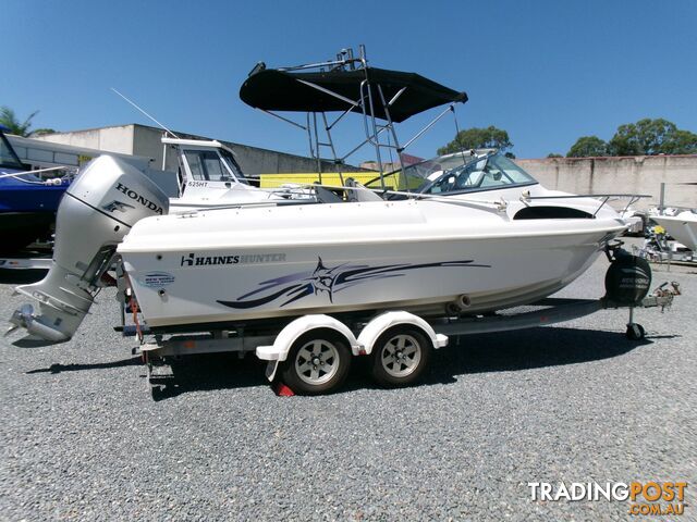 USED 2009 HAINES HUNTER 580 BREEZE POWERED BY A 2009 HONDA 4 STROKE 135 HP OUTBOARD ON AN EASYTOW DUAL AXLE TRAILER - photo 5 of 17