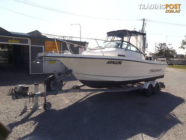 TROPHY WALKAROUND CENTRE CABIN-150HP SUZUKI 4 STROKE AND TRAILER