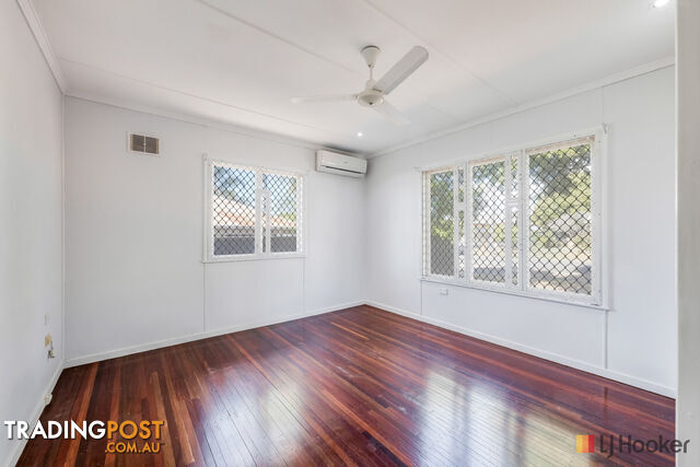 5 Barnes Street SVENSSON HEIGHTS QLD 4670 - photo 5 of 25