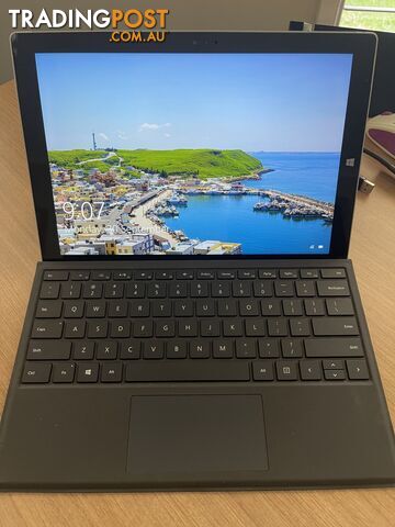 Microsoft Surface Pro 3 with charger, keyboard, docking station