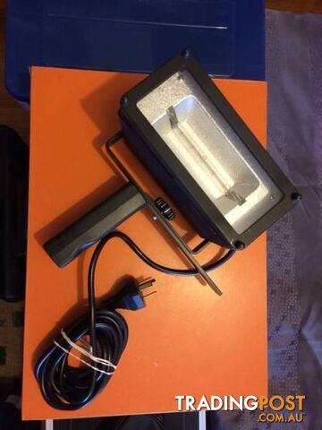 Powerful hand held studio light by UNOMAT in near new condition