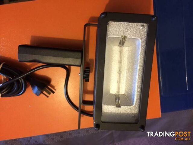 Powerful hand held studio light by UNOMAT in near new condition