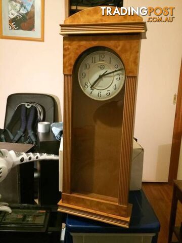 WALL MOUNTED CLOCK IN WOODEN CASE WITH GLASS DOOR