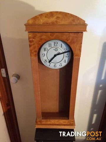 WALL MOUNTED CLOCK IN WOODEN CASE WITH GLASS DOOR